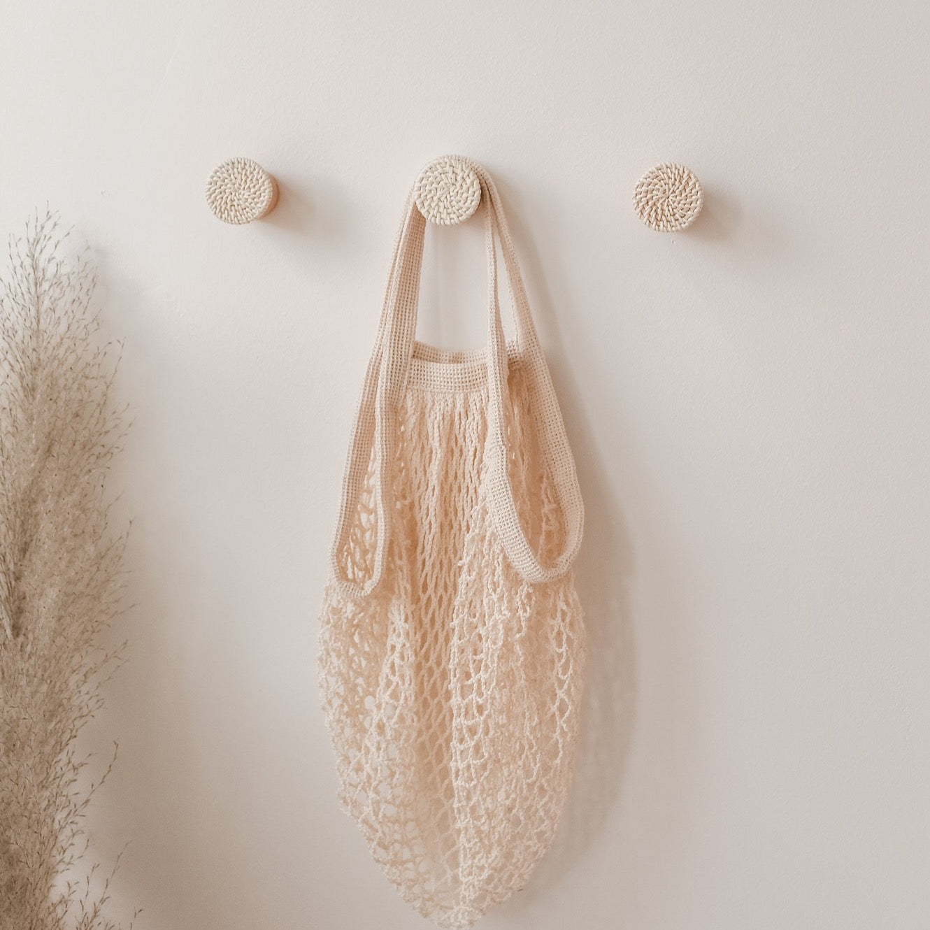 round rattan bag with sea shell decoration – Boho Living Room